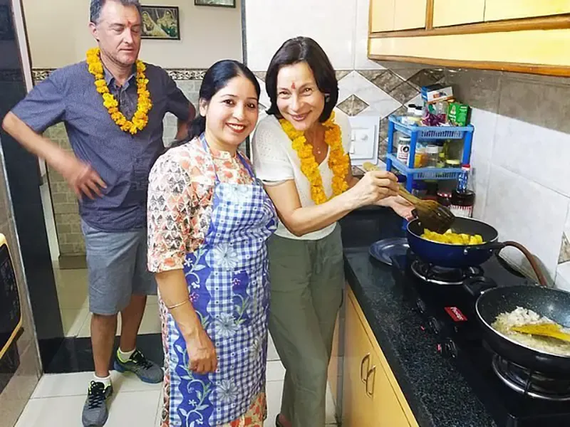 Cooking with women in an Indian home