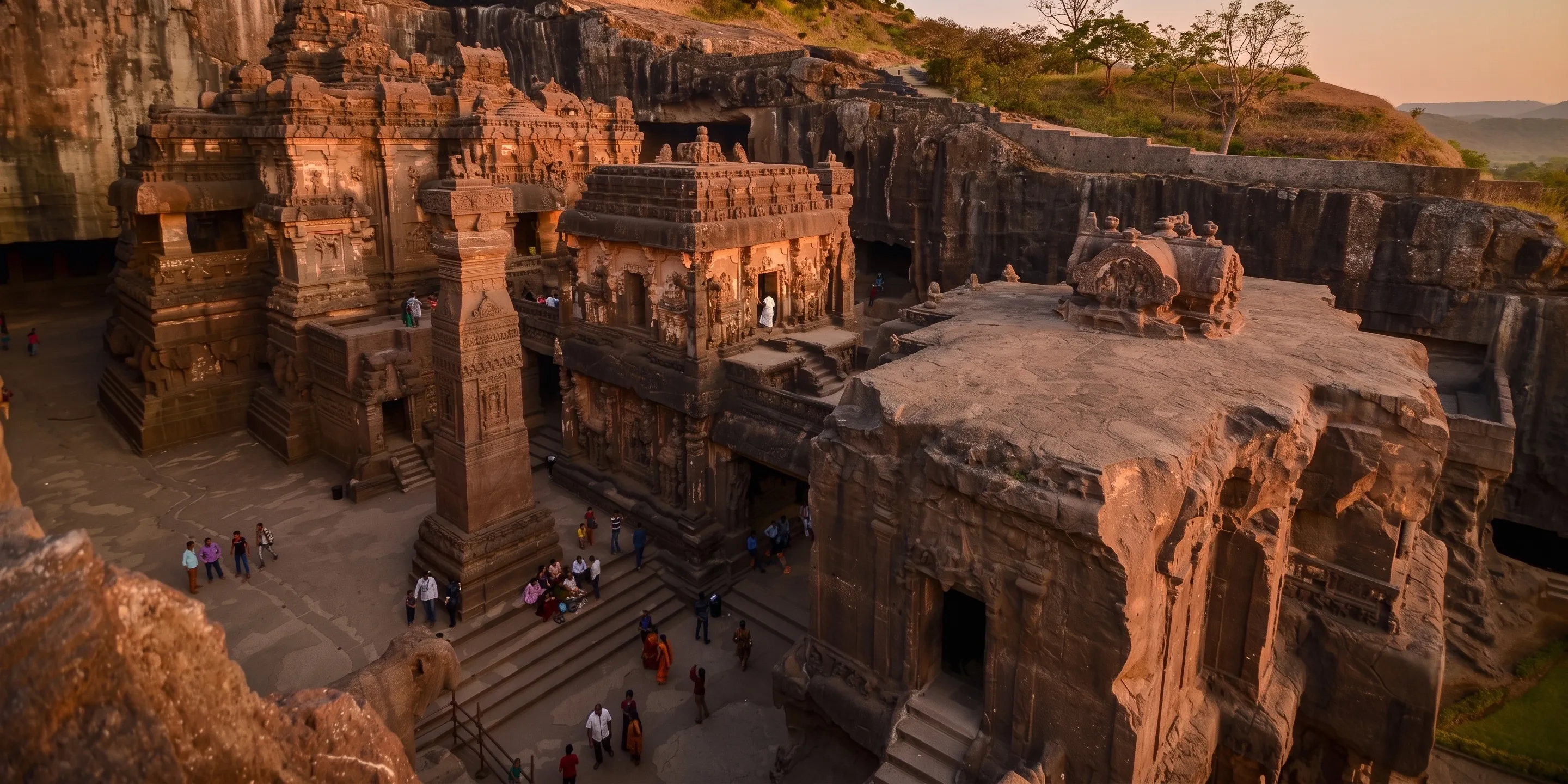 The rock-cut Buddhist façades of the Ajanta Caves curving along a cliff