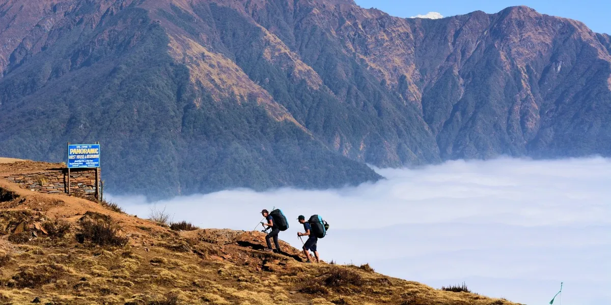 A trekking trail and snow peaks along the Annapurna Circuit, Nepal