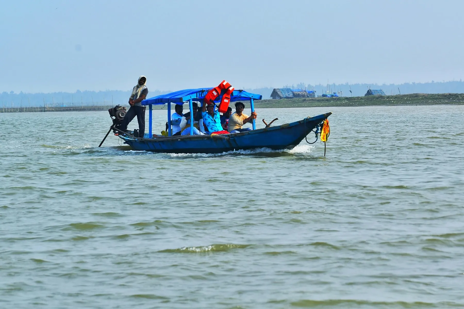 A boat on Chilika Lake in Odisha, a winter haven for India's migratory birds