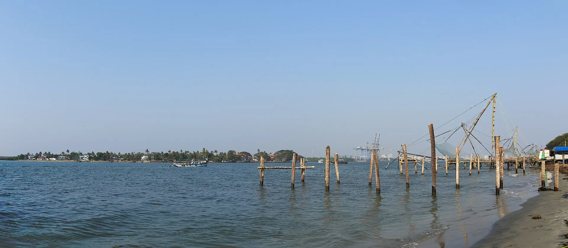 The Chinese fishing nets silhouetted along the waterfront at Fort Kochi, Cochin