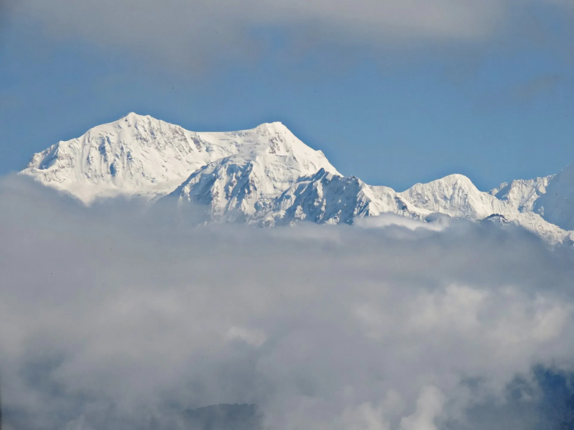 The snow-capped Kangchenjunga massif rising above the hills of Sikkim