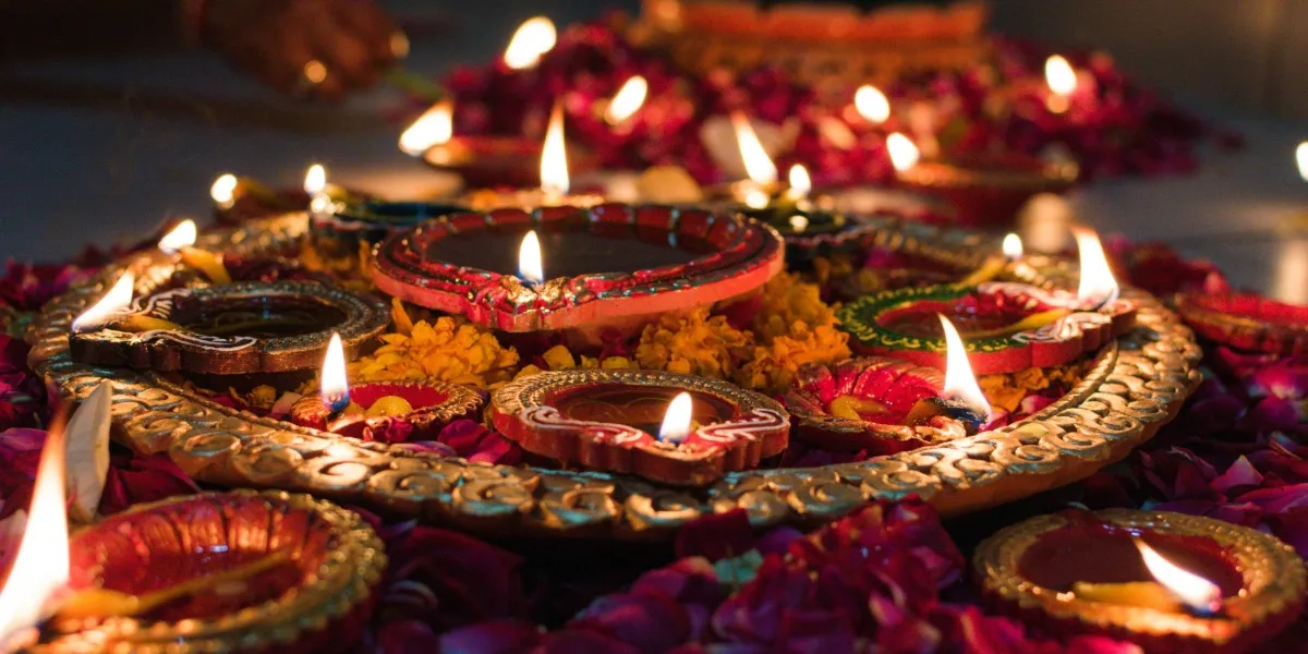 Oil lamps arranged in patterns on the ghats of Varanasi during Diwali
