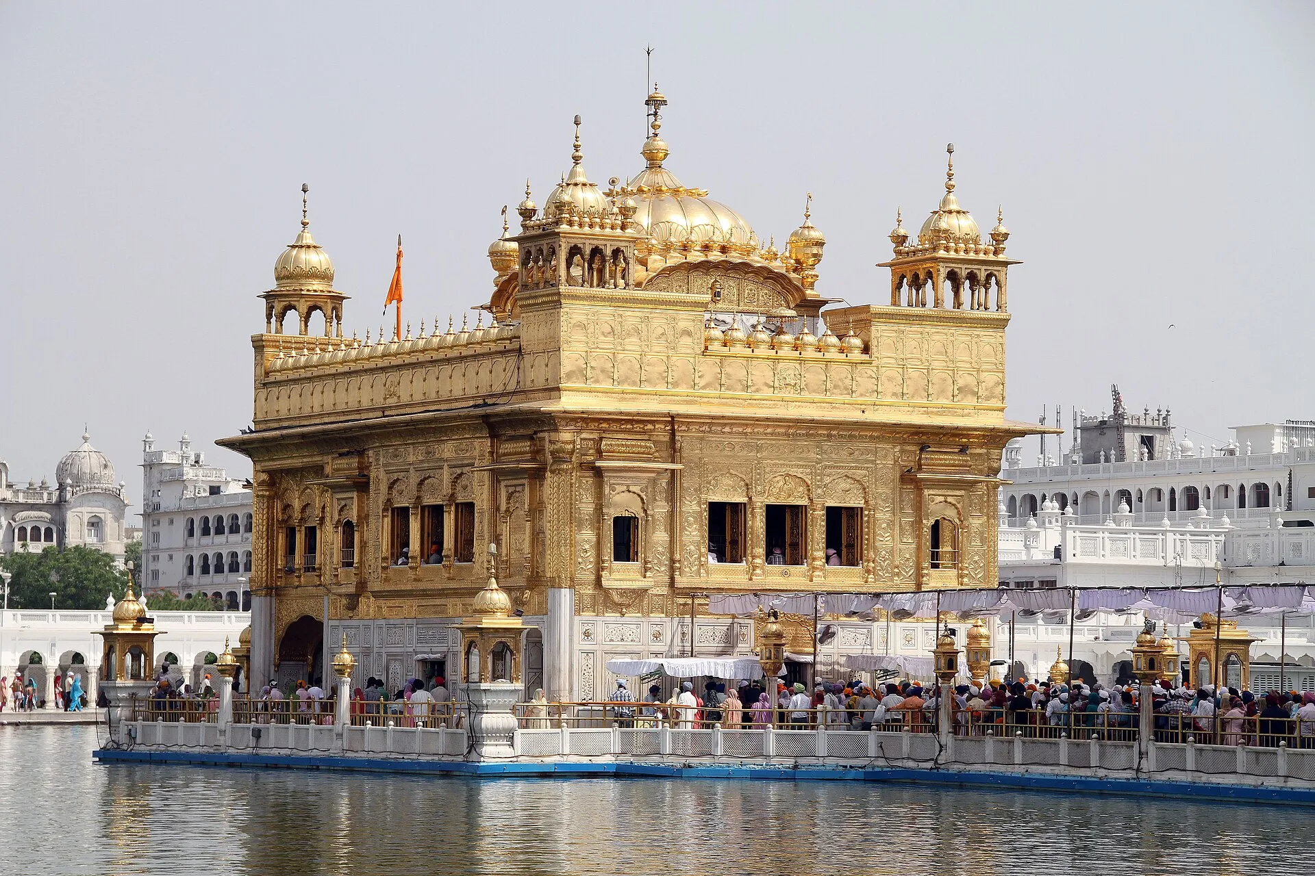 The gilded Harmandir Sahib reflected in its sacred pool at Amritsar