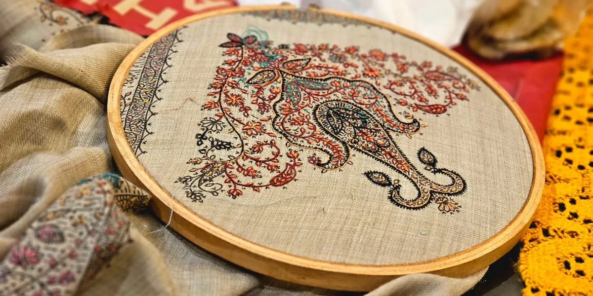 A finely woven 17th-century Kashmiri woollen carpet with millefleurs decoration