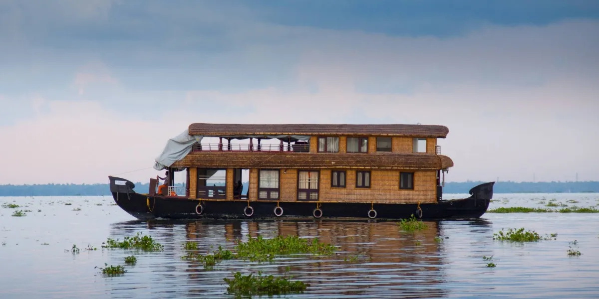 A houseboat on the palm-fringed Kerala backwaters