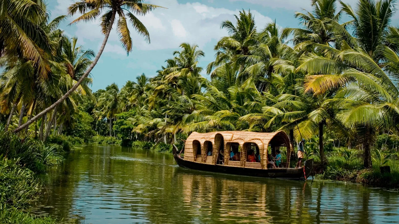A houseboat on the palm-fringed Kerala backwaters