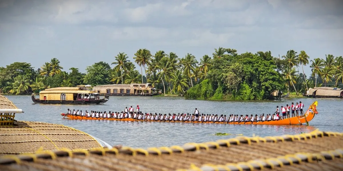 A traditional houseboat moored on the palm-fringed backwaters of Kerala