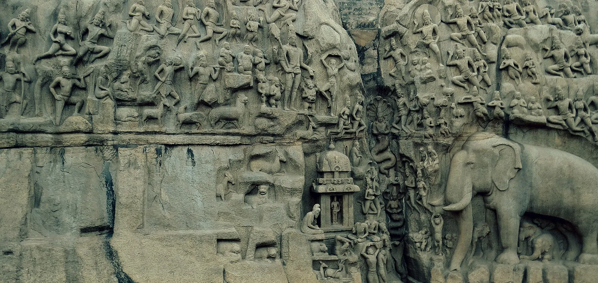 Carved figures on the Arjuna's Penance granite relief at Mamallapuram