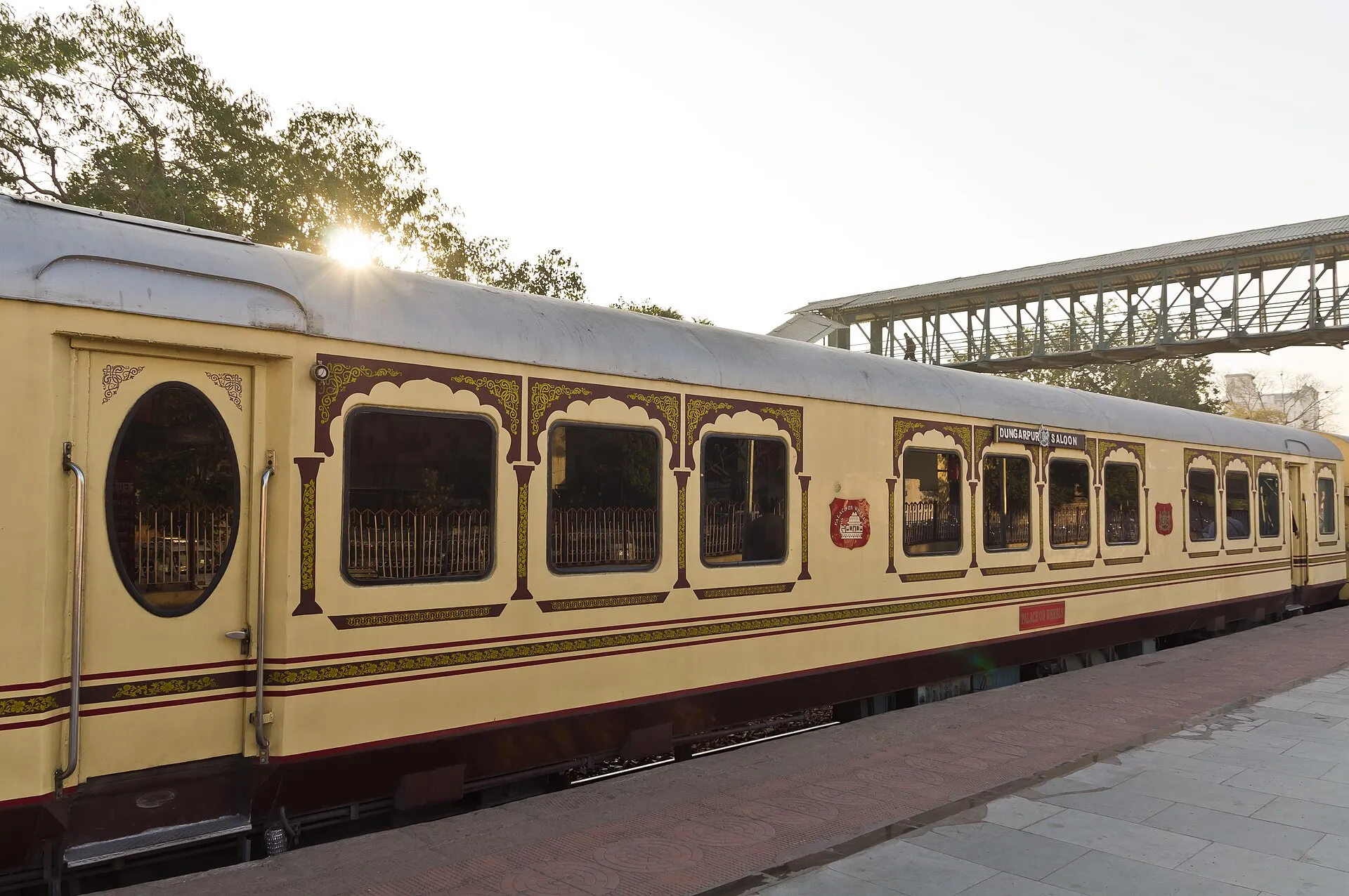 The ornate cream-and-maroon carriages of the Palace on Wheels at a Jaipur platform