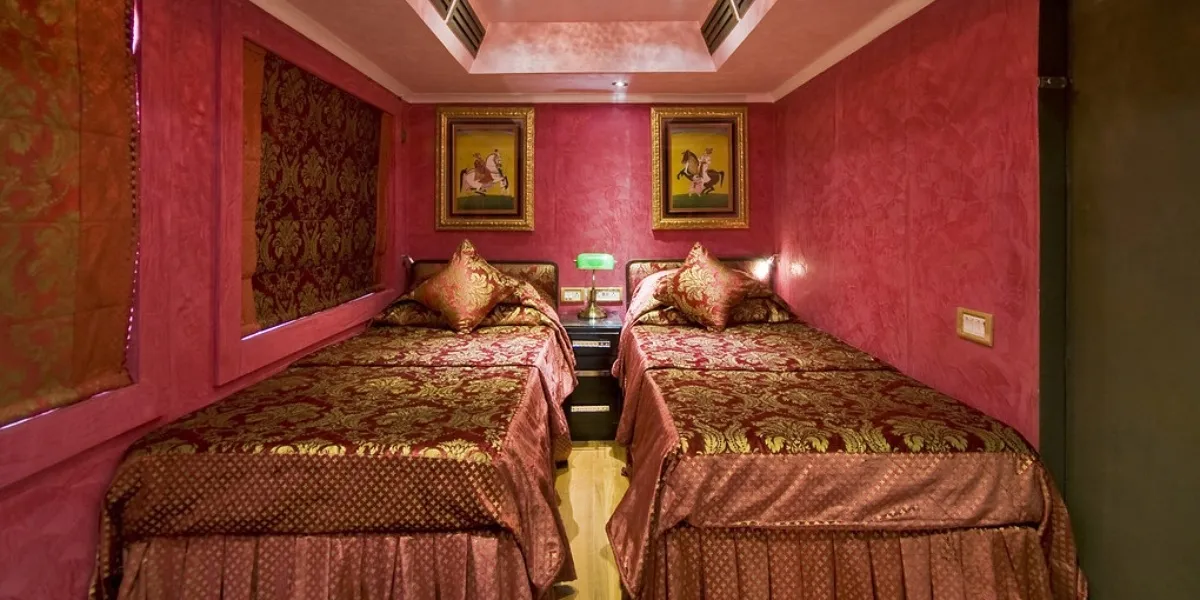 The ornate cream-and-maroon carriages of the Palace on Wheels at a Jaipur platform