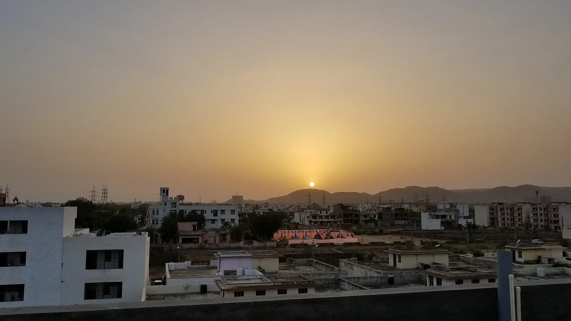 Warm sunset light over the rooftops and skyline of Jaipur, Rajasthan