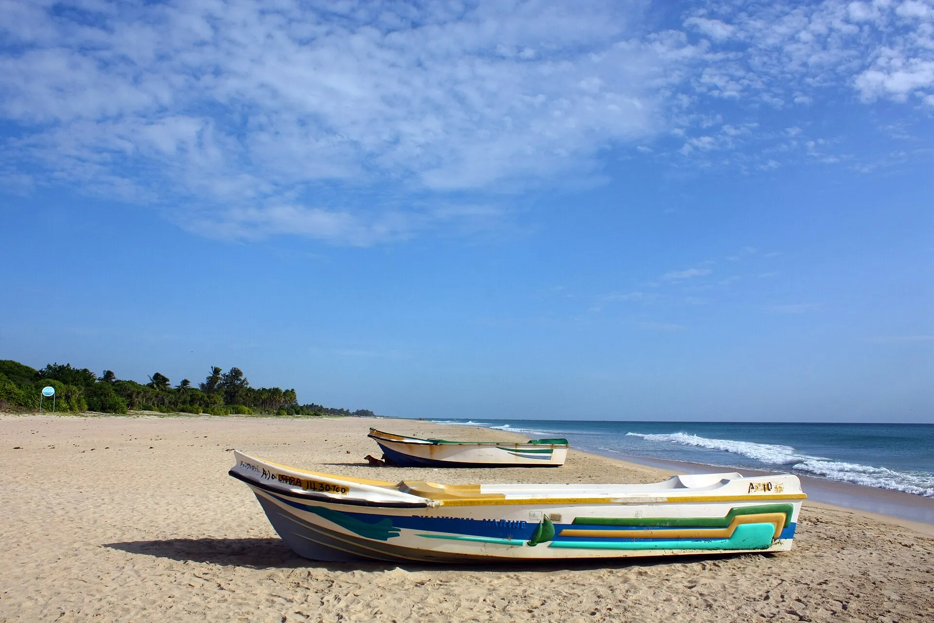 The wide sandy sweep of Nilaveli Beach near Trincomalee on the east coast of Sri Lanka