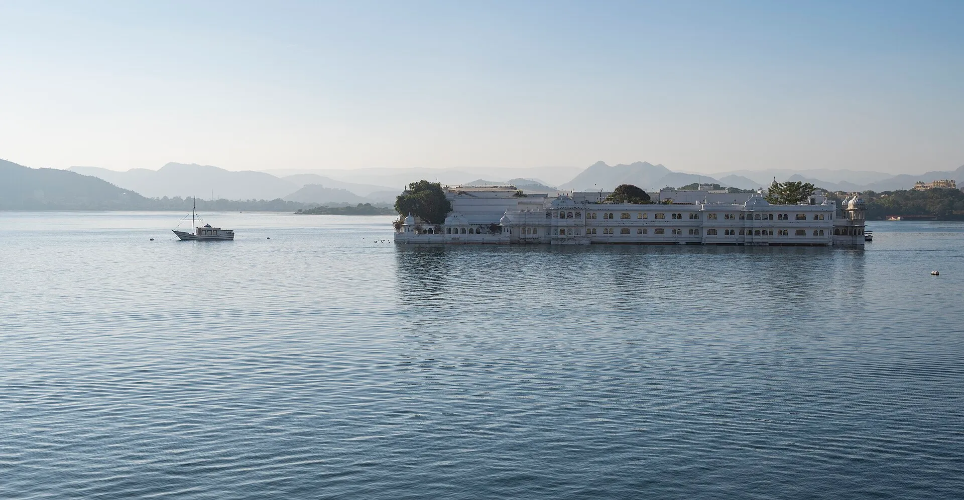 The Taj Lake Palace floating on Lake Pichola, seen from the City Palace in Udaipur