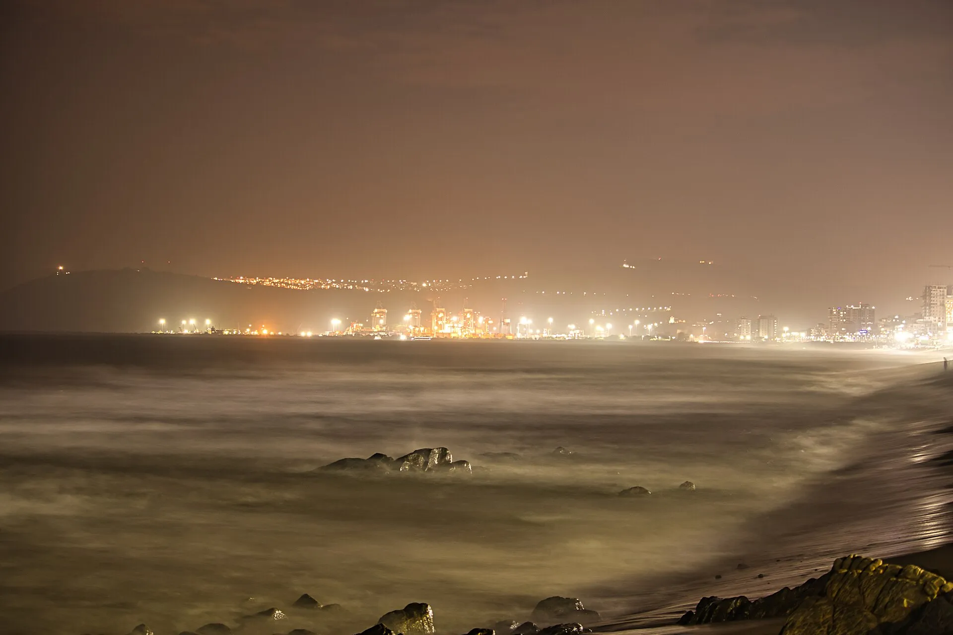 The Visakhapatnam port seen across the water from RK Beach