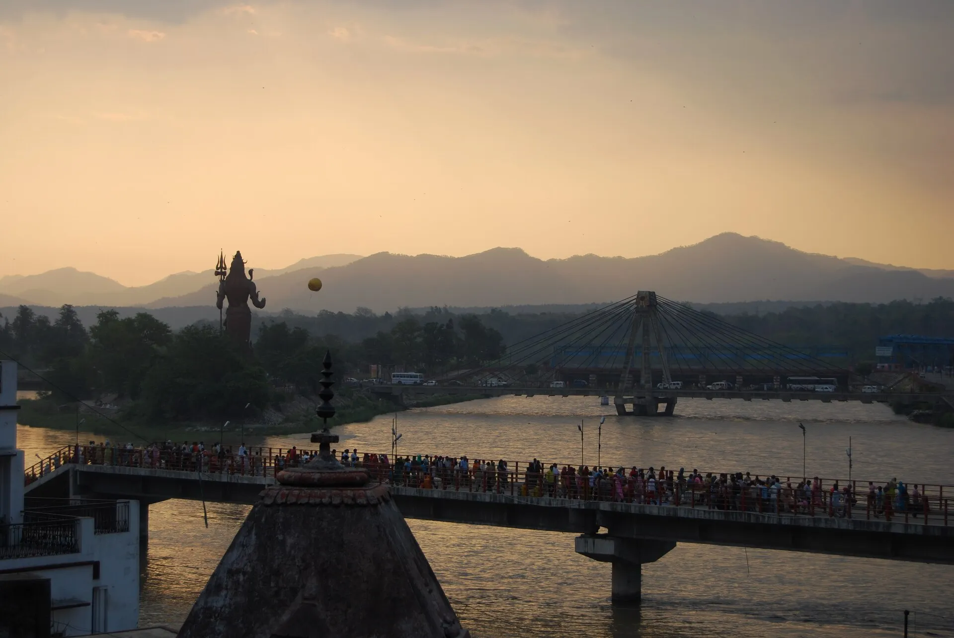 The River Ganges flowing past the temple town of Rishikesh in the foothills of the Himalaya